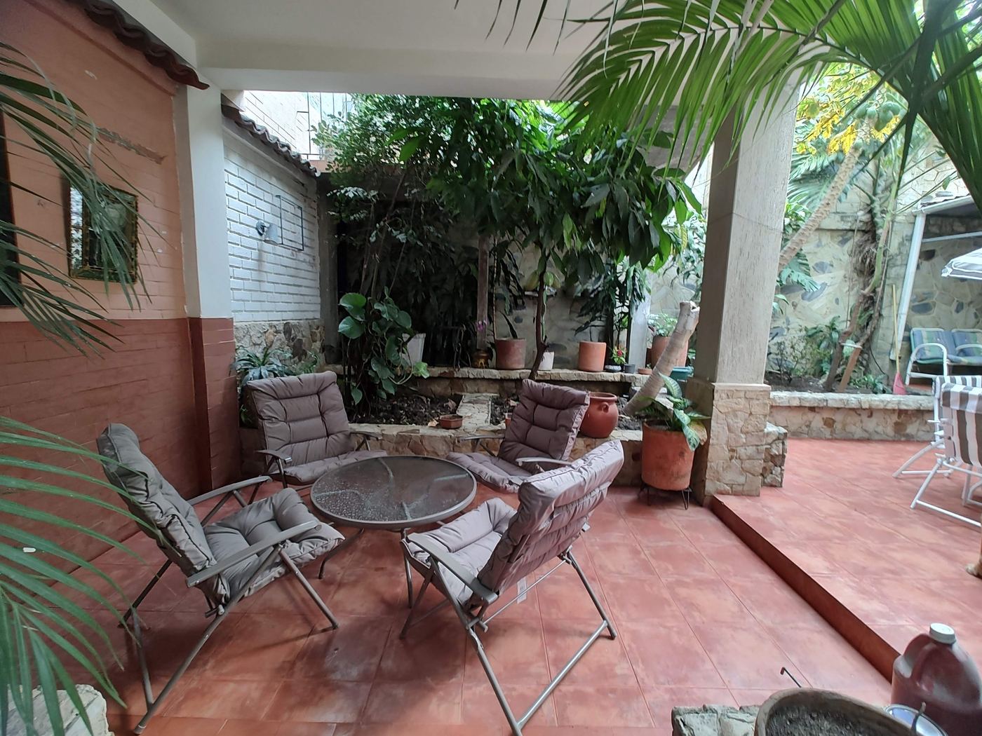 Covered patio next to the Herradura House garden